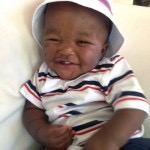 baby elijah smiles