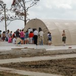 people outside tent church