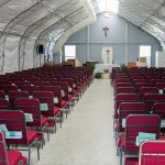 church tent red chairs