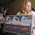 woman carry box clorox